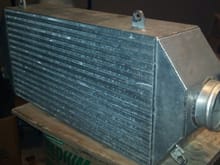 Air/Air intercooler 3 1/2in in and out. Two cores thick, it is large.