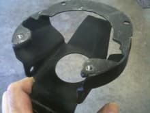 The bracket with the top tab removed.