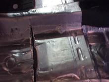 Floor coated in sound deadening material