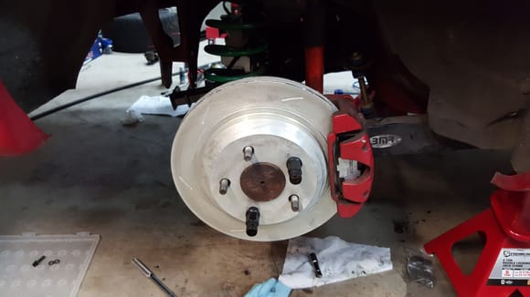 New rear slotted rotors, pads, and parking brake shoes. Already put Willwood 6 piston brakes on the front. Also stainless hoses.