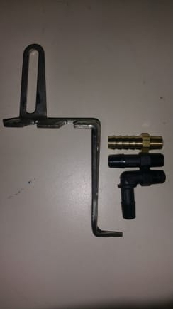 Old TB bracket that prevented the 90* nipple from rotating, and the three types of nipples