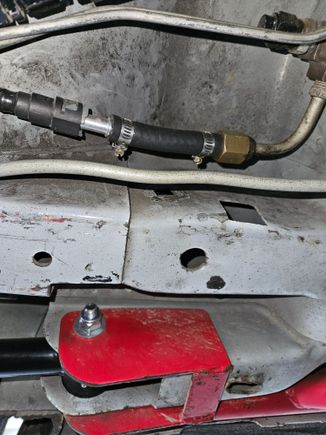 OEM fuel filter removed and fuel hose and fittings in place