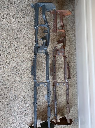 The Ospho treated coupe’s dash skeleton on the left and the bare, rusted donor skeleton.