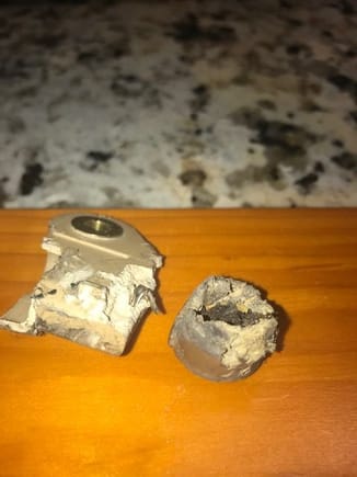 Plug part broke off first.  The round part is the part that was stuck in the cover,