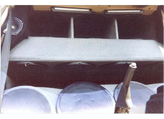 Inside my 92 Honda Accord 32 12&quot; subs, 5 marine batteries, 5 Earthquake 200Ds 2 18&quot; horns with 20lb drivers..lol,...
12 in the top rack facing down and up. 16 in the lower rack and the 4 across the floor = 32 twelve inch subs...lol. I am known for overdoing things.