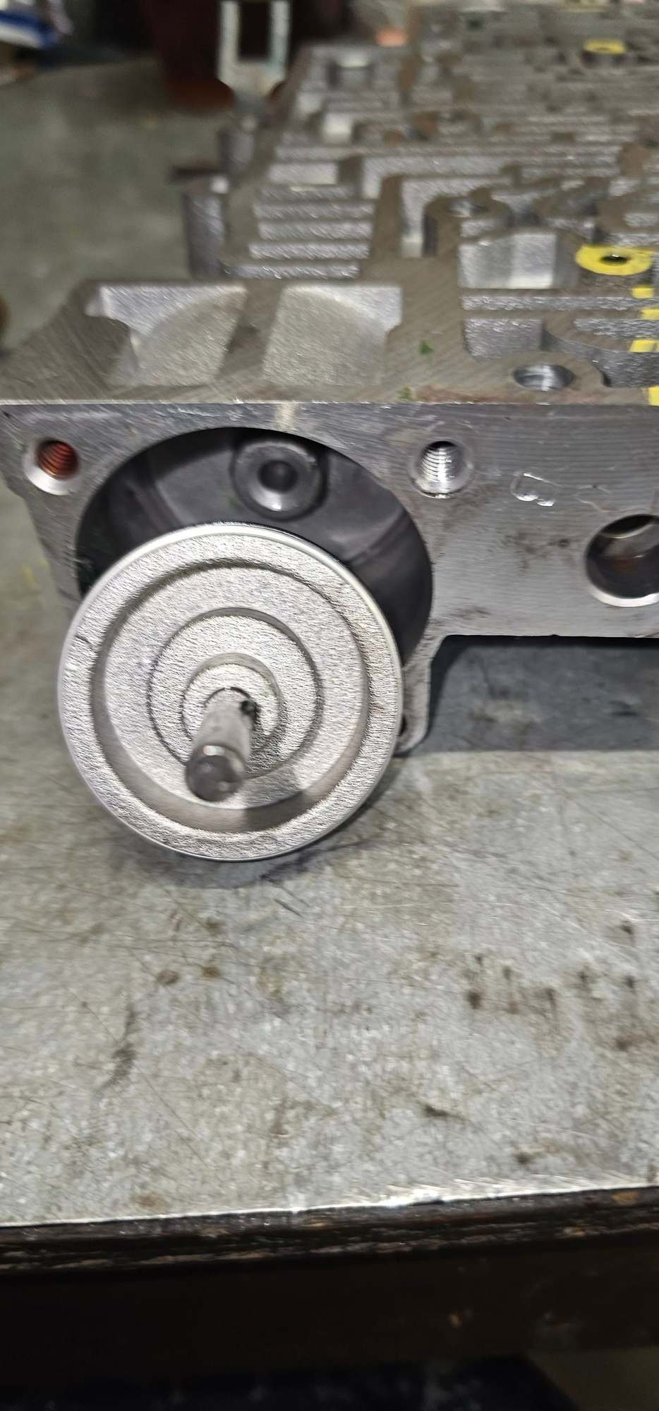 Remove the fwd accume cover and replace accum with metal one, Remove rev abuse spring and valve. 