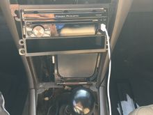 I already ordered a shift boot but I don't know what the panel is called around the shifter, it has the little hole on the top left for the cigarette lighter