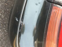 Same things as the fist image but this was caused by a careless woman in a parking lot. Smashed my right taillight as well. Replaced that a while back