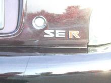 altima ser badge