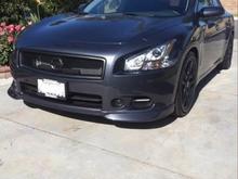 blacked out cmod grille w/ black nissan emblem