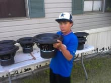 my youngest basshead Ethan daddy I can pick one up they weigh 44lbs each...
