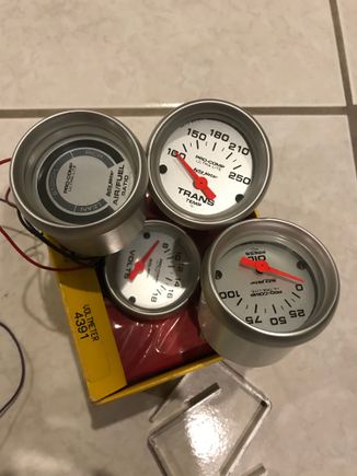 A/F is used, all others are new. Small dent in oil pressure gauge.  Missing sender for oil pressure and transmission temperature gauges.
100 for all