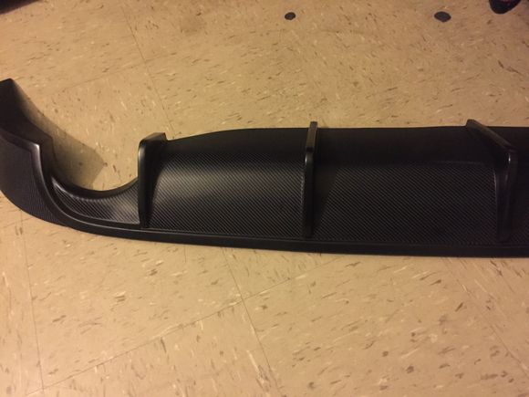 IKon rear diffuser... i had to get it wrap in carbon fiber bcuz the paint was not going to hold. I was told by a shop owner, he then suggested me to wrap it. So i did looks amazing...