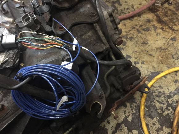 Ok so it's been quite a few years but in the middle of an engine swap I was easily able to access the inhibitor switch to add the diodes. This will isolate the Park and neutral indicator lights in the head display so they no longer both come on at the same time whether in Park or Nuetral. I'm not sure if I put the diodes cathode in the correct direction. 

If power comes from the 52 plug which I think it does then the cathode of the diode is in the wrong direction. Any thoughts ?