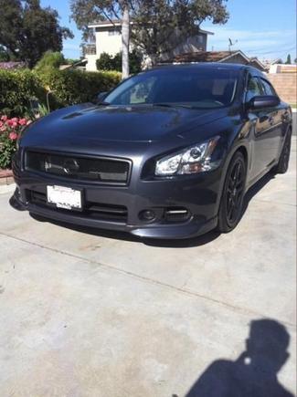 blacked out cmod grille w/ black nissan emblem