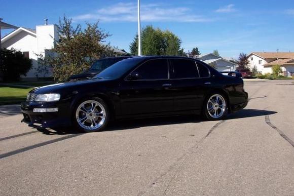 18" wheels, lowered with progressive springs and Tokico Illumina Struts, Brembo Brakes, and Monza Exhaust, plus many more