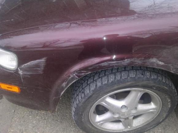 Mr. Max had a tussle with a newer model car today.  My heart is breaking to think of him sitting in the garage like this even knowing the other driver was at fault and the insurance train is gearing up to take over.  The quarter panel will probably need replacing and I'm just lucky it wasn't worse since this happened on a very busy road as rush hour was beginning.