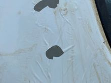 Has moisture seeping under paint 