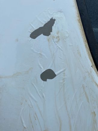 Has moisture seeping under paint 