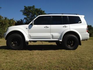 The icelandic style is to fit large, wide tires, without having to jack the car up too far.  This reduces sway and tipping, offering better handling and crawling