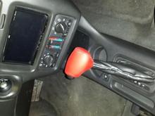 Pace car red leather gear shift.