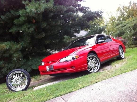 My monte and the spare fifth rim I bought