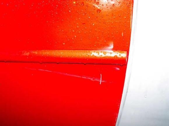 gash in the door that actually bent the jamb, needs fixed still