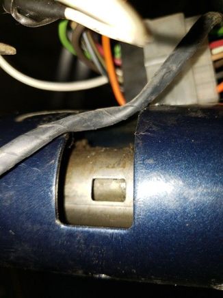 Lever attaches to the steering column