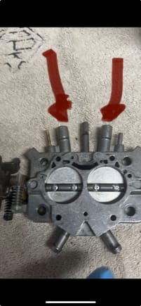 Should there be mixture screws here?  There was not any when I pulled the carb.   