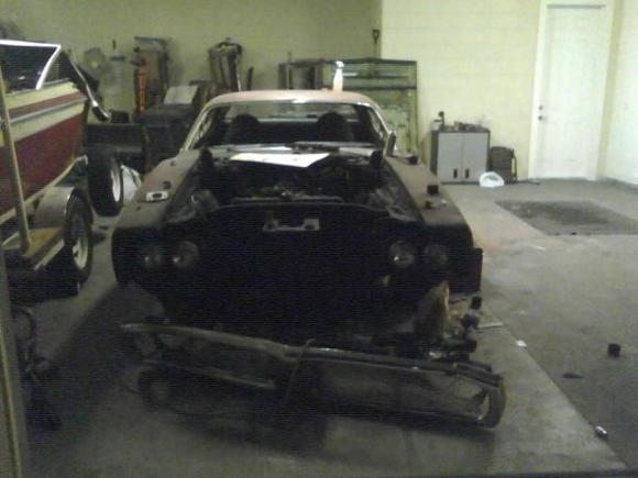 front clip dissasembled to sand and prep the inner fender wells