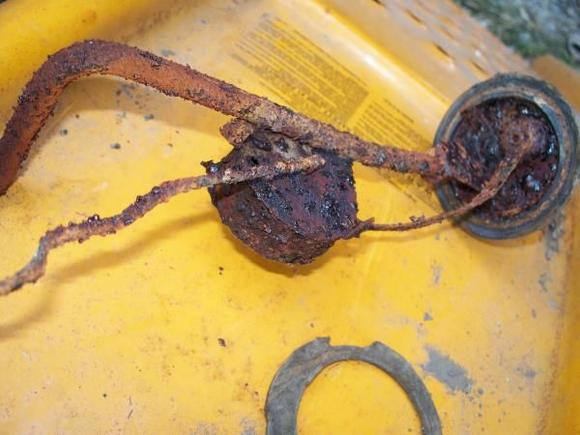 Nasty sending unit removed from the 67 Belvedere June 09. Looks like it came out of the Titanic.