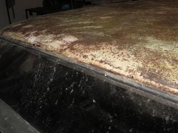 upper back window shot beneath vinyl of plymouth fury III