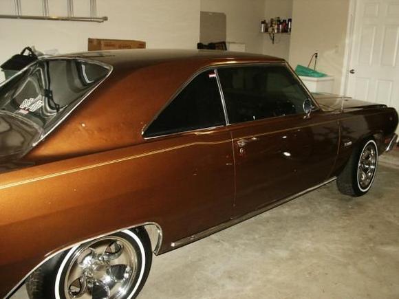 A little bit of mothers cleaning wax goes a long way. At one time this may have been a decent paint job, sadly it will have to be repainted.