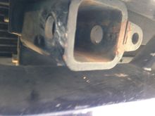 Some rust on both sides.  Looks like it's made for towing or something.