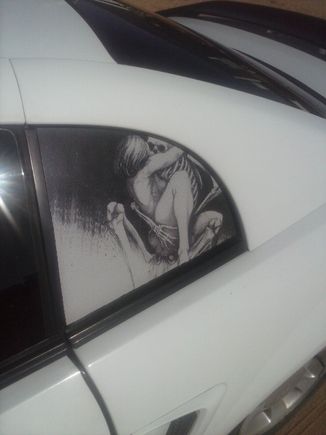 Left rear window perferated vynal decal