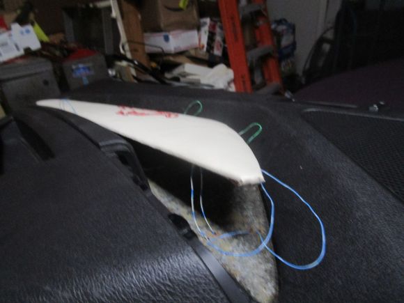 Insert wires being threaded into door panel