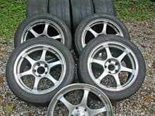 Five SSR alloy wheels, and eight extra tires: six RA1s and two R888s.