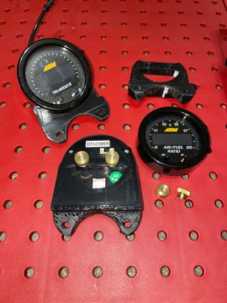 Gauge mounts to install aftermarket gauges where oem center triple pod goes