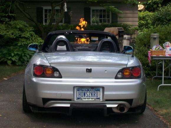 thought it was a funny pic.. the bar-b-q was flaming in front of the s2000.. the food was good :)