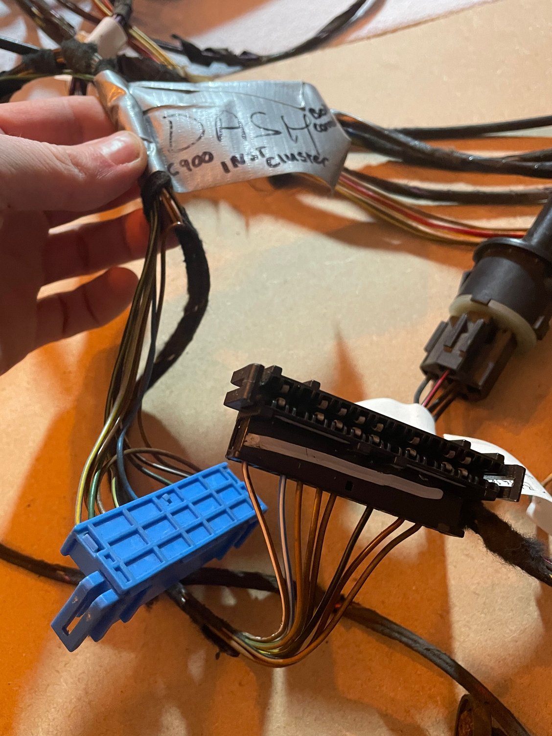 Two connectors for instrument cluster,  �c-900� on wiring diagrams.  Diagram I have shows fuel tanker sender unit connecting to here via brown/black core.  