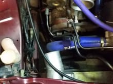 Now with the hose off, the intercooler end is 60mm and the turbo 50mm but i found another o/e hose and laid it over the silicone one....