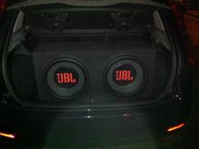 My twin 15inch JBL subs (taken in the dark of course). 
I have only 3inch's free space in my boot now.