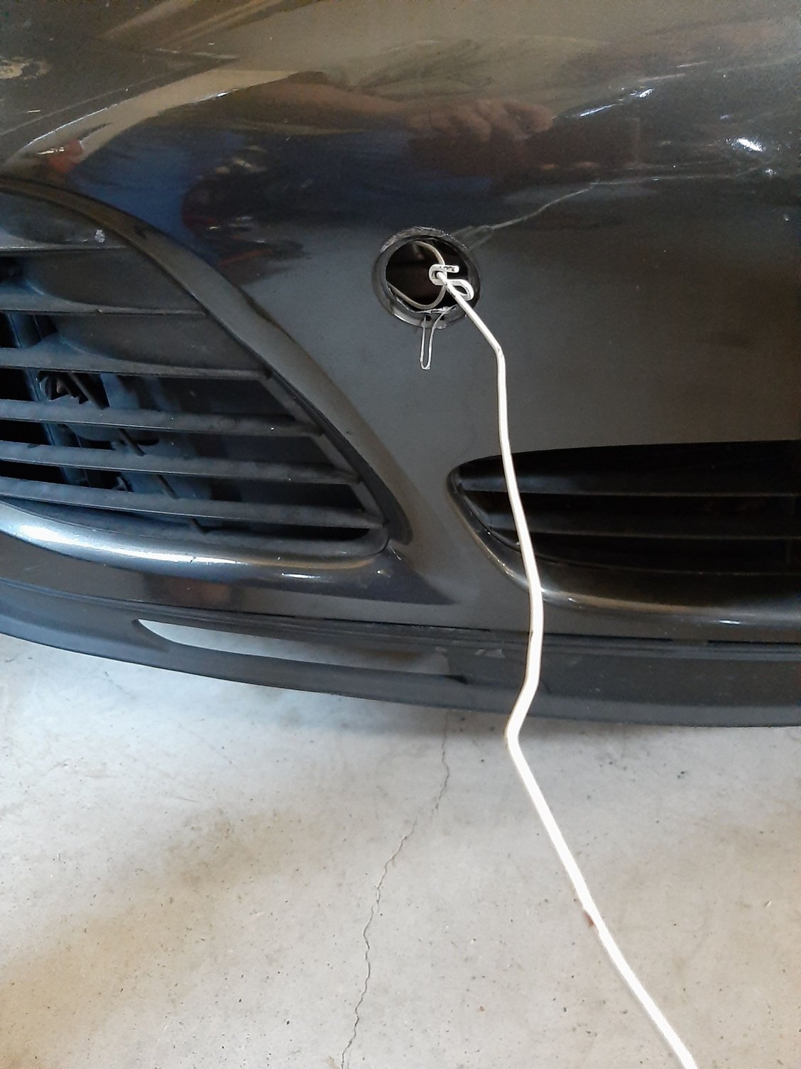 Ready rerouting emergency hood release cable on Porsche 996T