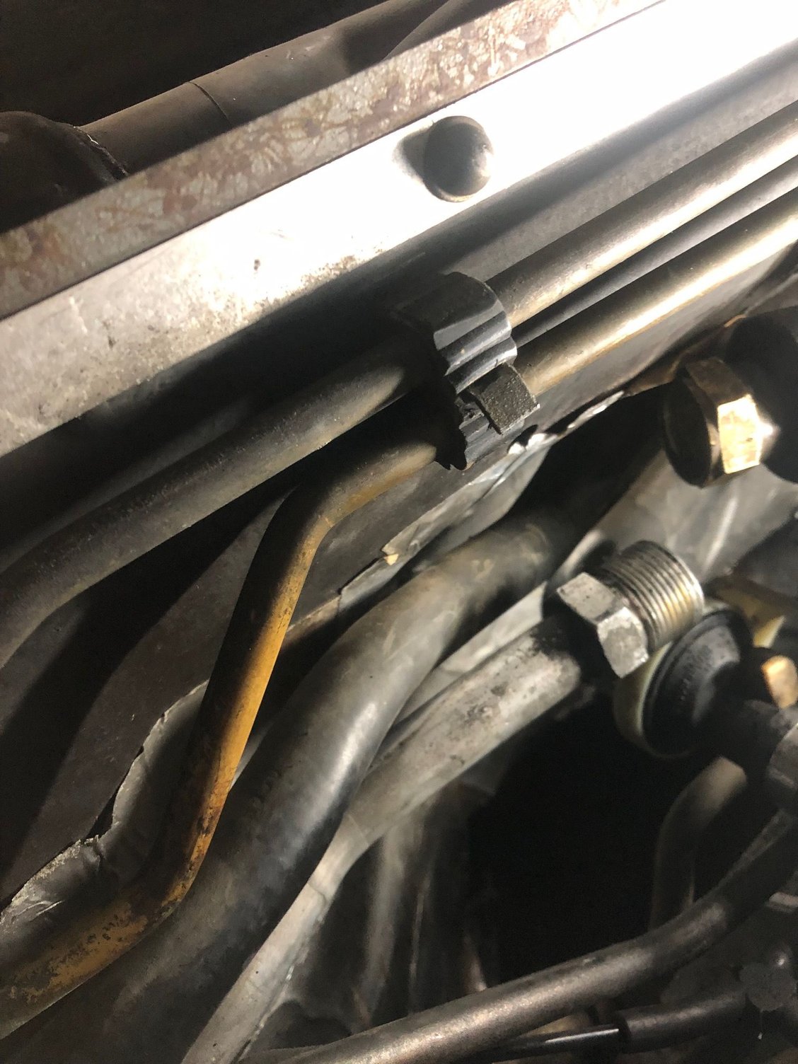 Pulled the injector clamp as well to get More movement in the line to fit the new Expansion Valve