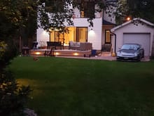 With drive thru door is nice.. if you limited width wise.. a roll up might be cool going into the back yard.. not to drive the car into the yard but you can do some cool lighting amd make ot part of your landscape.. 