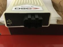 Mini USB from your laptop to upload custom PASM tunes or a more aggressive tune direct from DSC. There library of suspension tunes are free, no charge to download.