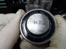 The dot-peened label from LNE on the shoulder bolt.