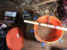 Trying rust-removal by electrolysis.  Battery charger, rebar and water with salt and baking soda.  This is what my current profile picture is of.