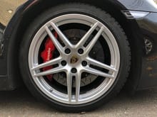 Front narrow 19" snows over big old Brembo GT380MM.  That's 14.96 inches compared to the stock 12.99 inches for the base Carrera.