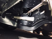 The new GT2 ducts add even more air routed from under the car and through the front body liner right onto the bottom portion of the rotor.  With the deflectors above this pic shows just how much air is routed directly onto the rotor now.